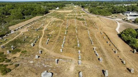 Explore megaliths at Menec site in Carnac, known for ancient stone alignments in Stock Photos