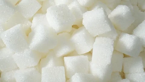 Explore the mesmerizing world of purified sugar cubes in this macro video. Stock Footage 248415810