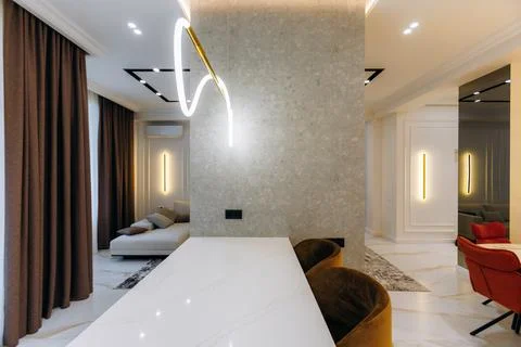 Explore Modern Interior Design Featuring Elegant Lighting and Stylish Furniture Stock Photos