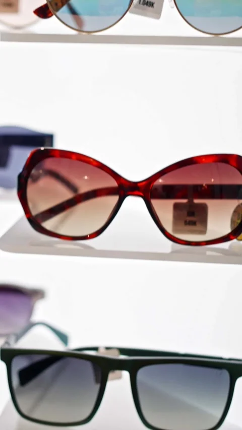 Explore our exclusive and trendy collection of stylish sunglasses that are Stock Footage 308230796