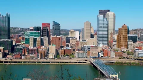 Explore Pittsburgh with views of buildings, rivers, and bridges in bright s.. Stock Footage 332743716