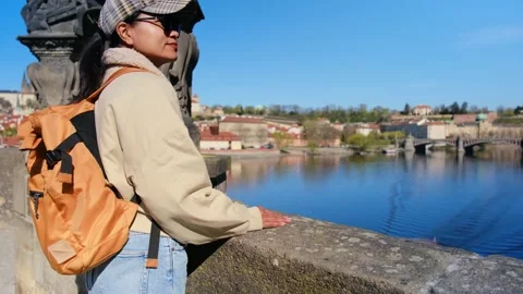 Explore pragues charming views from the iconic charles bridge on a sunny day Stock Footage 333093806