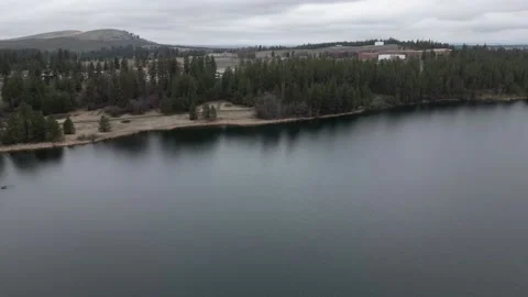 Explore the Pristine Waters of Medical Lake, Washington from a New Perspective Stock Footage 237968517
