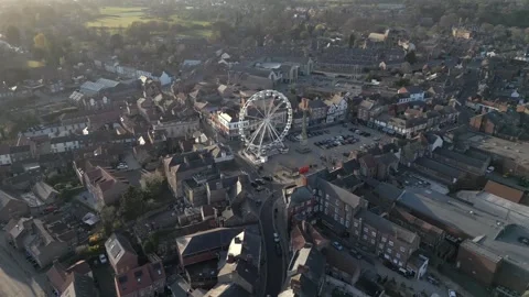 Explore Ripon's Charming Aerial Views Featuring a Vibrant Ferris Wheel and Stock Footage 309385621