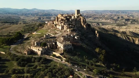 Explore the ruins of Craco, an abandoned medieval town in Basilicata, Italy. Stock Footage 304668107