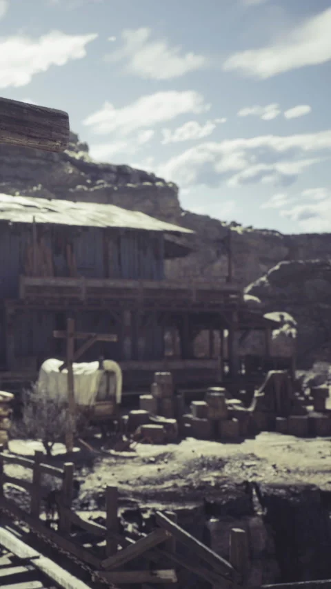 Explore the rustic charm of a forgotten western town in the midday sun Stock Footage 331803904