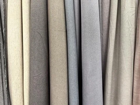Explore a selection of elegant fabric textures in soft muted tones 스톡 사진
