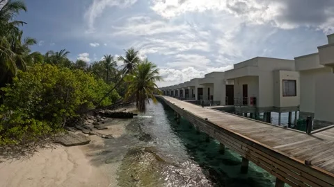 Explore the serene beauty of Maldives beachfront villas Video stock 286105053