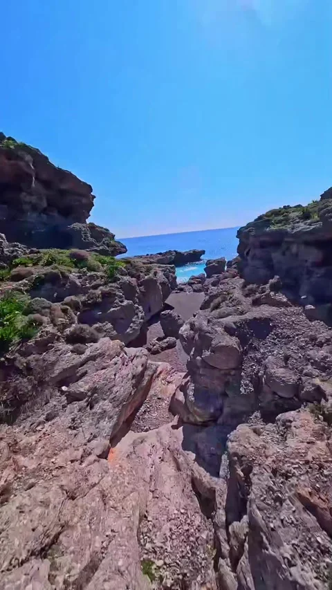 Explore Sfakia Beach from above with stunning views of nature and coastline. Vídeos de archivo 335041565