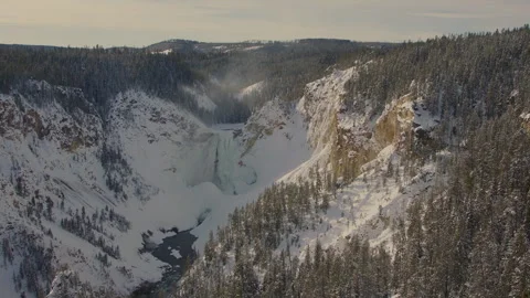 Explore the snowy creek waterfall forest with stunning winter landscapes and Stock Footage 288474256