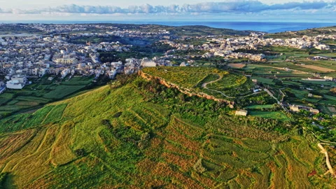 Explore the stunning aerial view of Malta rural landscape at dusk Stock Footage 306641384