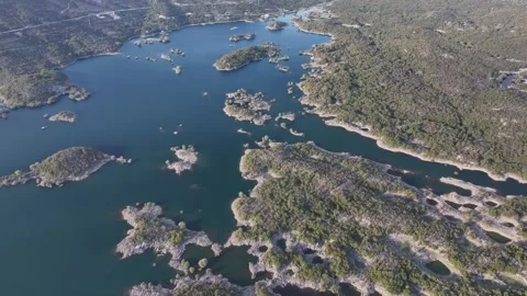 Explore the stunning aerial view of Slansko Lake surrounded by lush nature and Stock Footage 287794012