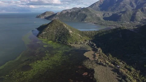 Explore the stunning aerial views of Skadar Lake and its lush surroundings Stock Footage 287792183