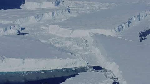 Explore stunning Antarctic sea ice and frozen icebergs revealing majestic Stock Footage 288232907