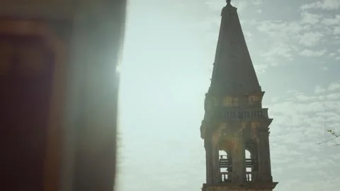Explore the stunning bell tower of Perast City with breathtaking views and rich Stock Footage 313731647