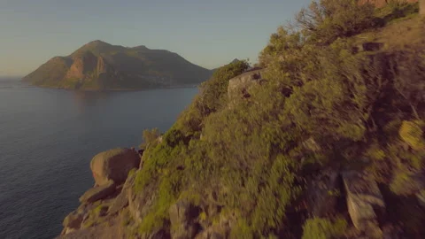 Explore the stunning cliffside ocean bay in South Africa captured by drone Stock Footage 288086627