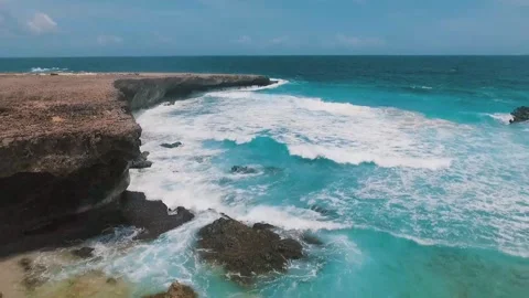 Explore stunning coastal cliffs and turquoise waters in summer Video stock 320303965