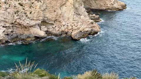 Explore stunning coastal cliffs with clear waters and breathtaking scenic n.. Foto stock