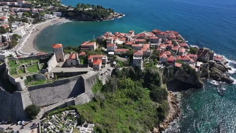 Explore the stunning coastal views of the ancient fort and picturesque village Stock Footage 287801490