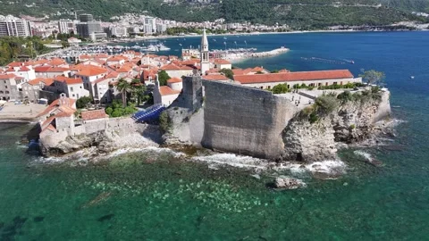 Explore the stunning coastal views of Budva, Montenegro with its ancient Video stock 287759848