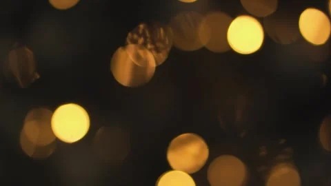 Explore a stunning collection of Bokeh Backgrounds with soft, golden lights Stock Footage 340920851