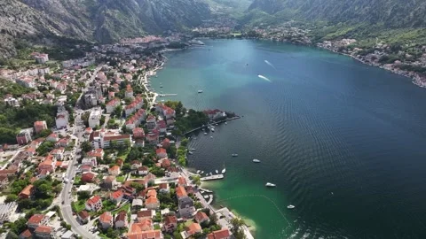 Explore the stunning landscape of Kotor Bay showcasing vibrant homes and Video stock 287769172