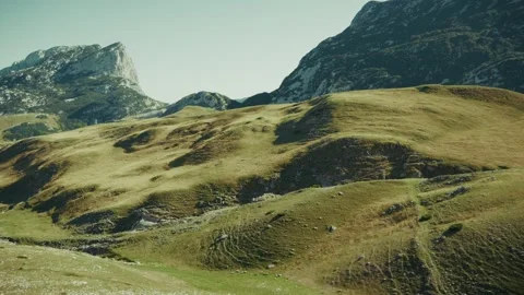 Explore the stunning landscape of Montenegro with rolling hills and mountains in Stock Footage 327012136