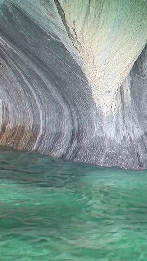 Explore stunning marble formations at Marble Caves in Los Alerces National Park Stock Footage 299866238