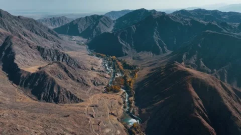 Explore stunning mountain landscapes and rivers in the valley Stock Footage 320304183
