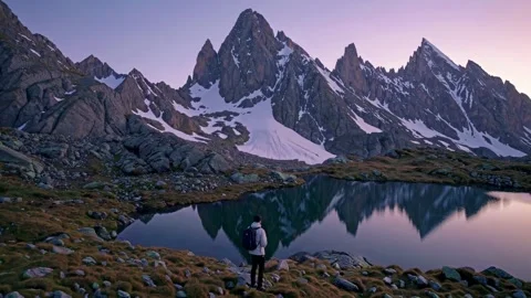 Explore the stunning mountains and serene reflection in a tranquil alpine landsc Stock Footage 296194008