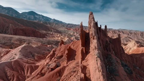 Explore stunning red rock formations in a remote valley Video stock 320303957