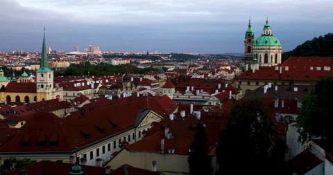Explore the stunning skyline of Prague during twilight with its iconic red roofs 스톡 동영상 283796334