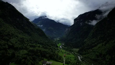 Explore the stunning valleys and mountains of the Swiss Alps Stock Footage 320265030