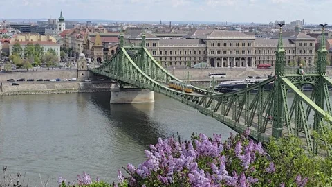 Explore the stunning views of Budapest from the iconic Liberty Bridge in Stock Footage 333507701