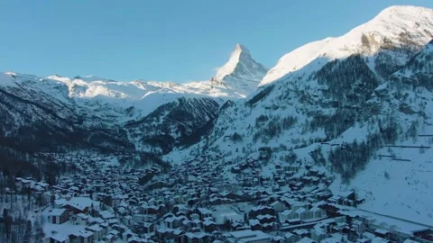 Explore stunning views of a snowy mountain village in winter Stock Footage 320262877