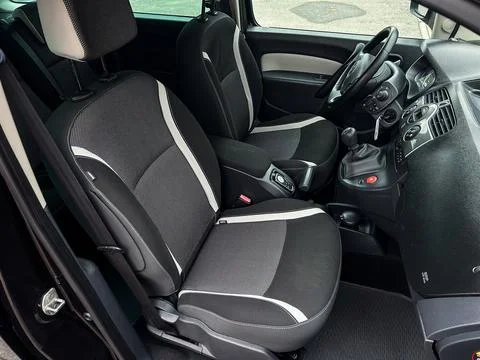 Explore a stylish car interior with sleek seating, comfortable cushions, and  Stock Photos