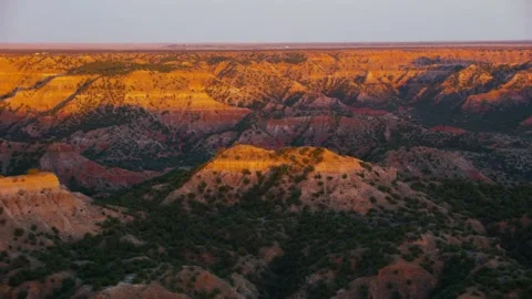 Explore sunset views over the desert landscape from the cliff edge Stock Footage 320265039