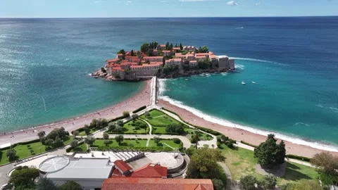 Explore Sveti Stefan's stunning coastline and beautiful architecture in this Stock Footage 287797448