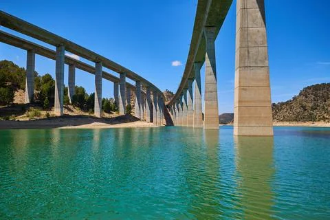 Explore the tranquil scene under the bridge Viaducto de Contreras through r.. Stock Photos