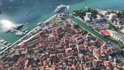 Explore the unique charm and historic beauty of Kotor Old Town from above with Stock Footage 287781344