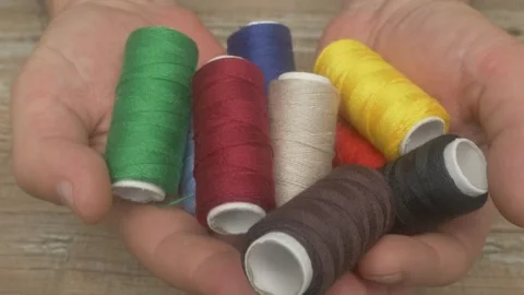 Explore a Variety of Colorful Threads for All Your Sewing Projects Quality Craft Stock Footage 287455105