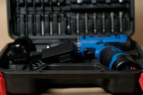 Explore the versatility of a tool kit featuring a powerful cordless drill Stock Photos