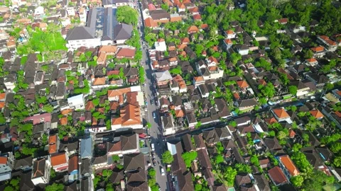 Explore the vibrant areas of Ubud, Bali from a birds eye view on an exciting Stock Footage 312740038