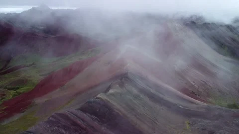 Explore the vibrant colors of Rainbow Mountain in Peru Video stock 320293354
