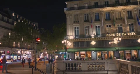 Explore the vibrant streets of the Opera area in Paris at night. Discover Stock Footage 334583668