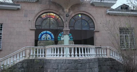 Explore the vintage charm of a worn and weathered railway station building, a Stock Footage 252467324