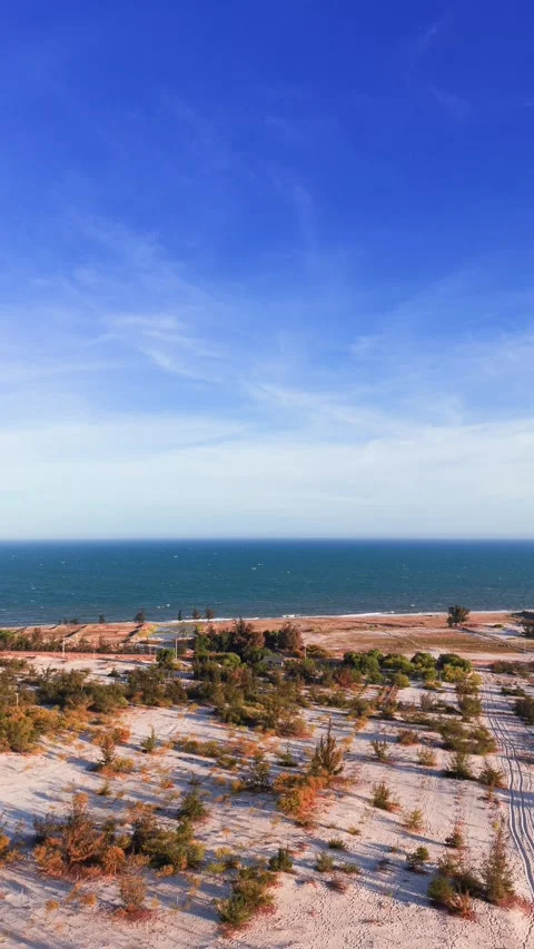 Explore the white sand dunes in binh thuan vietnam with drone aerial views. 库存影片 333431271