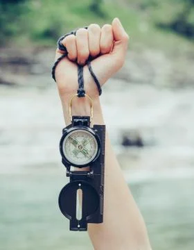 Explorer with a compass Stock Photos