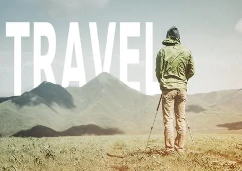 Explorer man standing in front of word travel over mountains. Stock Photos