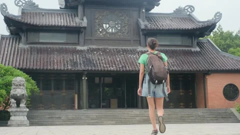 Explorer, navigating the enigmatic Southeast Asian temples Stock Footage 248513521